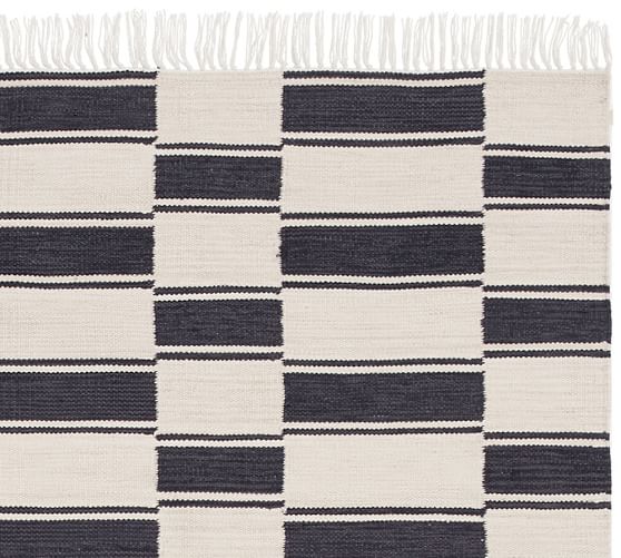 The Emily & Meritt Ticking Stripe Indoor/Outdoor Rug Pottery Barn