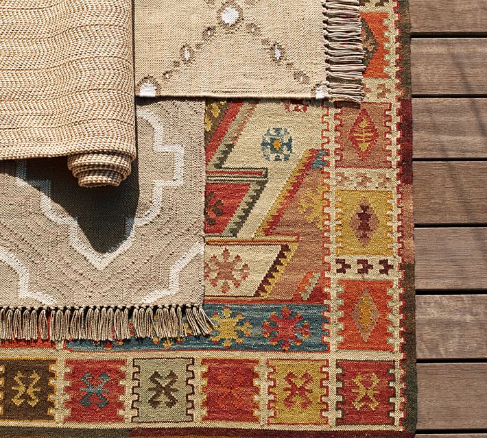 Show your plaiditude with this eco-friendly indoor/outdoor rug ...