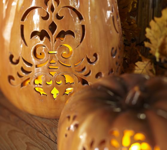 Punched Ceramic Pumpkin Luminaries | Pottery Barn