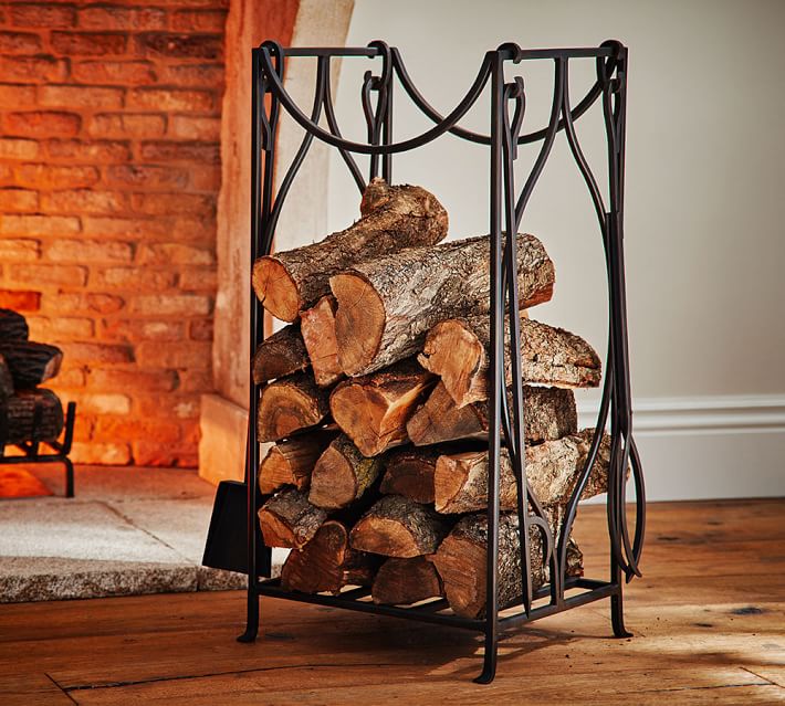 Moroccan Twist Firewood Holder & Tool Set | Pottery Barn Graceful arches combine with simple lines in this fireplace piece that holds logs and tools within its stylish frame. DETAILS YOU