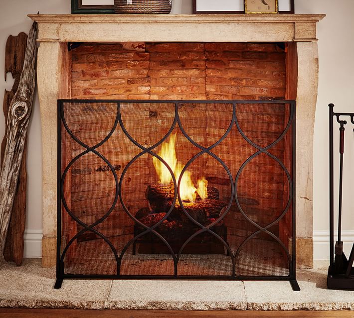Moroccan Twist Fireplace Single Screen | Pottery Barn Graceful curves combine with simple lines in this fireplace screen